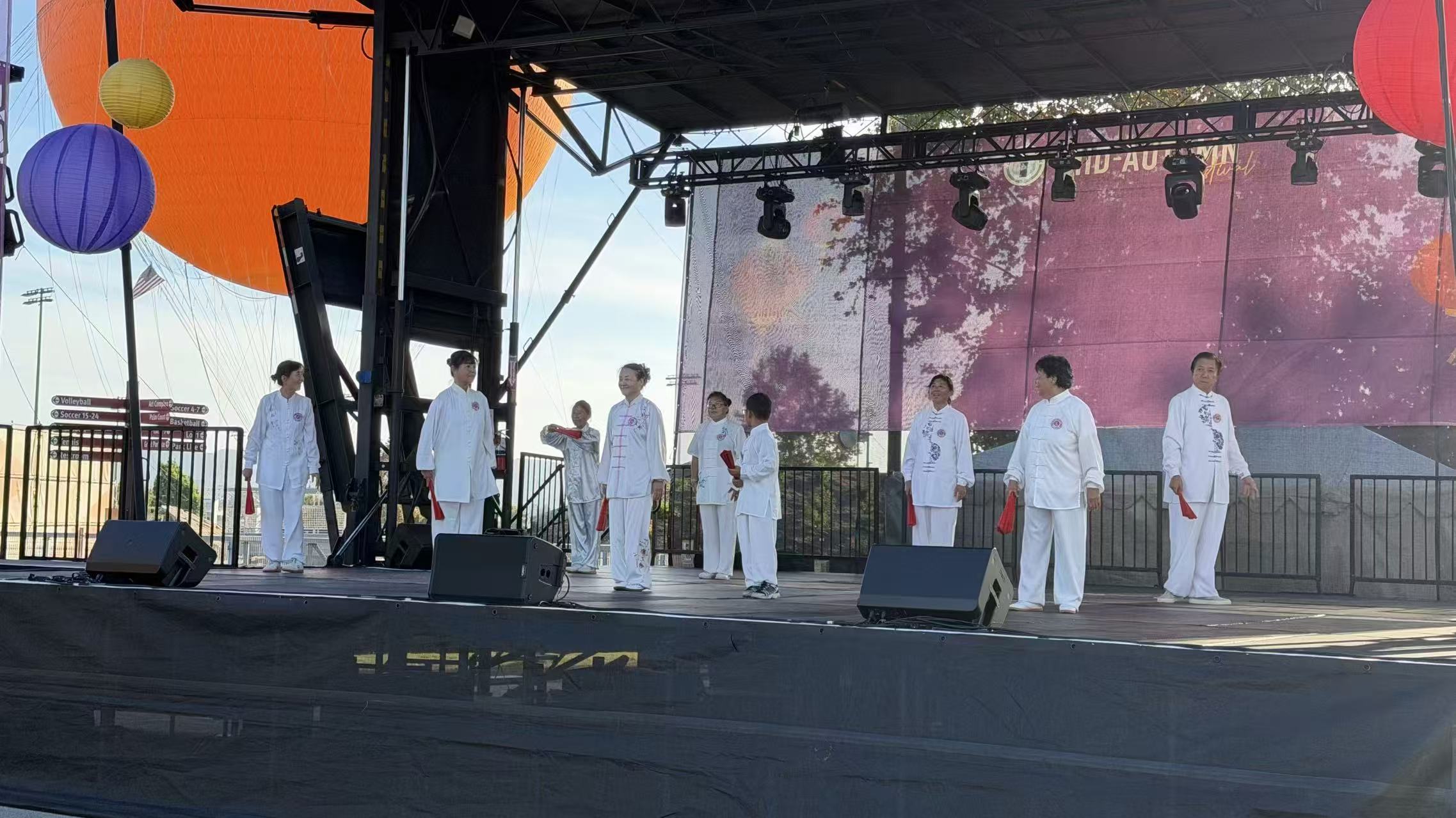 Tai Chi team performing on the Mid-Autumn Festival stage