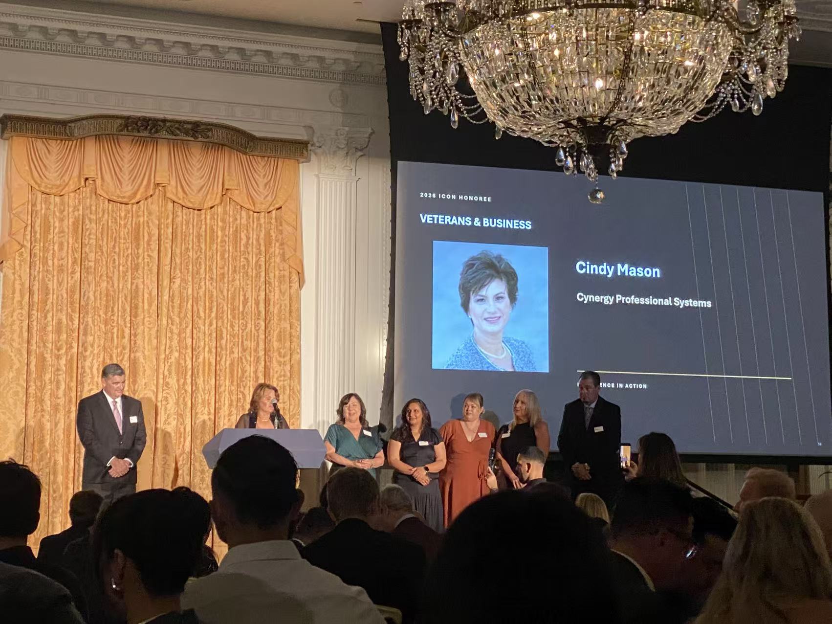 A 2026 Icon honoree on stage